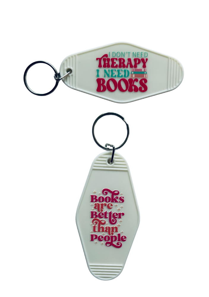 White Motel-Shaped Keyring – Bookish Quote (Double Sided)